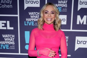 Dr. Nicole Martin backstage at Watch What Happens Live; she's smiling, wearing a pink dress, and resting her hand on her baby bump