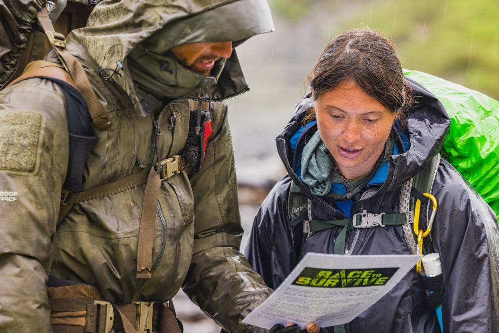 Kennedy and Nik on Race to Survive: New Zealand looking at a map 