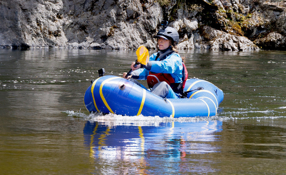 Paulina Pena paddling down a river in a packraft on Race to Survive: New Zealand Episode 9