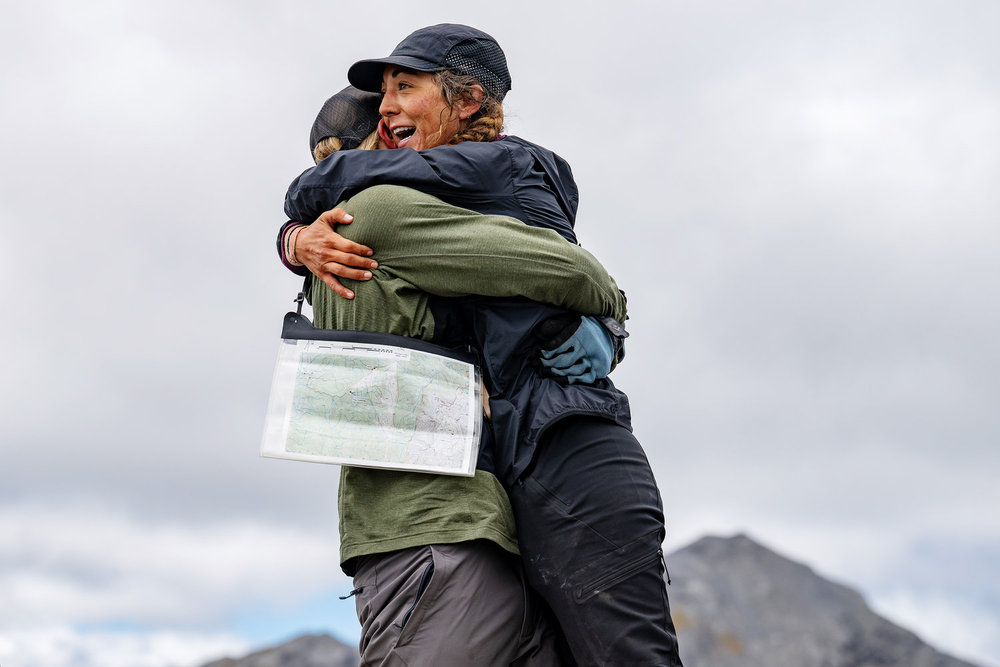 Paulina Pena and Creighton Baird huggnig on Race to Survive: New Zealand