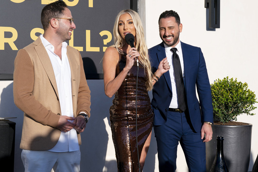 Matt Altman, Heather Altman, and Josh Altman filming MDLLA Season 15.