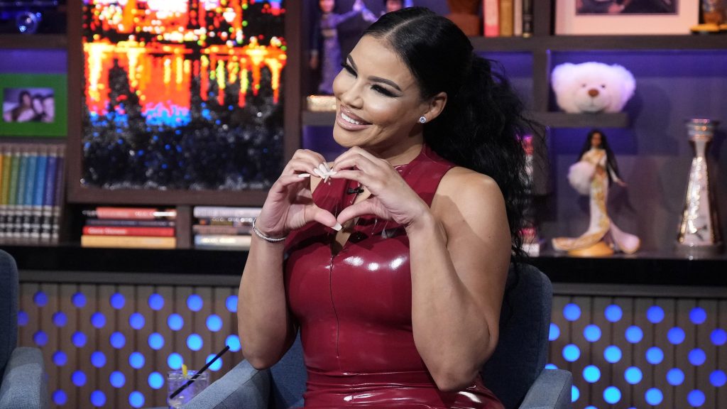 Mia Thornton making a heart sign with her hands on WWHL.