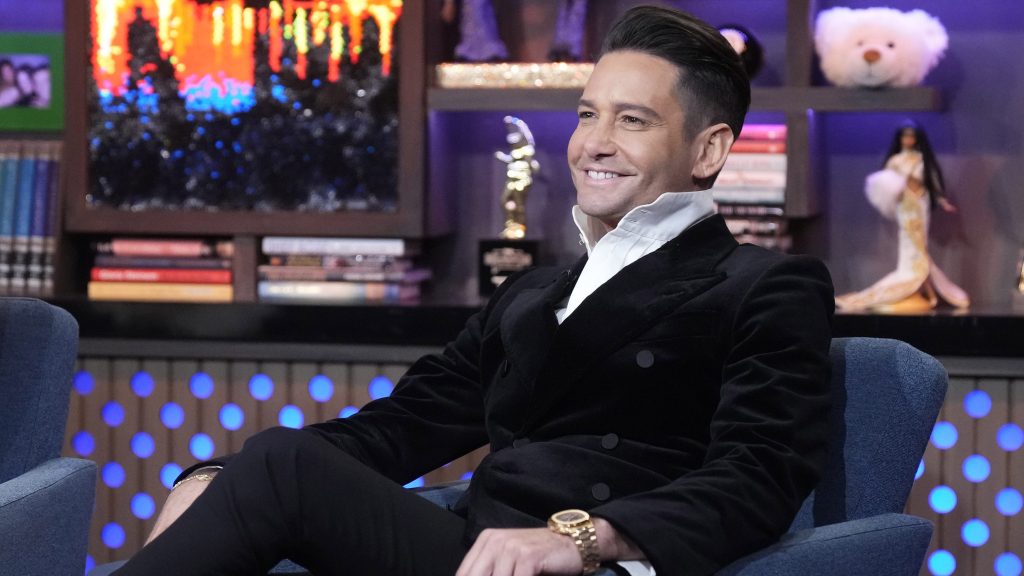 Josh Flagg looking pleased with himself on WWHL.