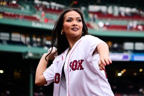 Jenn Tran throwing out the first pitch at a Red Sox game.