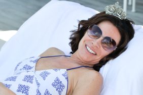 Luann de Lesseps relaxing outdoors.