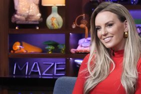 RHOSLC star Whitney Rose in a red dress and smiling on WWHL.