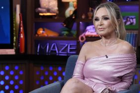 Tamra Judge looking serious and wearing a pink dress on WWHL.