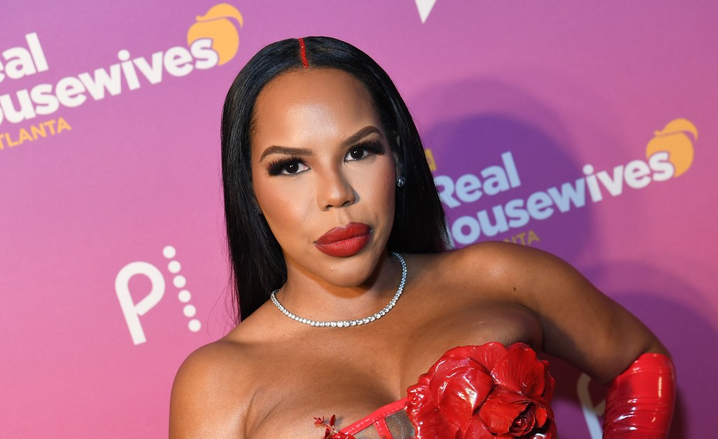 Kelli Ferrell in a red dress at the Real Housewives of Atlanta Season 16 premiere