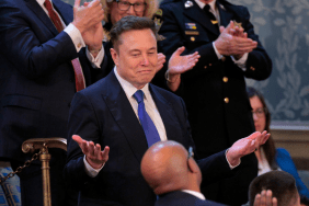 White House Senior Advisor to the President and Tesla and SpaceX CEO Elon Musk stands after being recognized by U.S. President Donald Trump while addressing a joint session of Congress at the U.S. Capitol on March 04, 2025 in Washington, DC. President Trump was expected to address Congress on his early achievements of his presidency and his upcoming legislative agenda.
