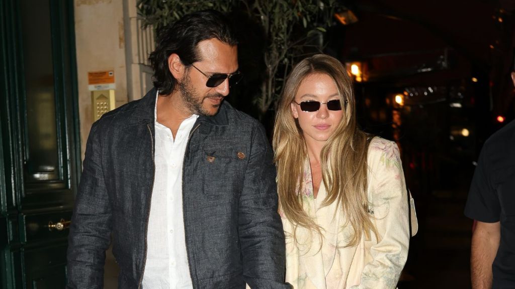 Jonathan Davino and Sydney Sweeney are seen leaving a Italian restaurant on July 11, 2024 in Paris, France.