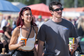 Dua Lipa and Callum Turner during day four of Glastonbury Festival 2024 at Worthy Farm, Pilton on June 29, 2024 in Glastonbury, England.
