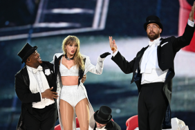 Taylor Swift is joined on stage by Travis Kelce (R), during "Taylor Swift | The Eras Tour" at Wembley Stadium on June 23, 2024 in London, England.