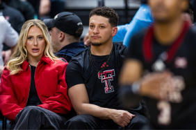 Brittany Mahomes and Patrick Mahomes look on during the second half of the game between the Houston Cougars and the Texas Tech Red Raiders at United Supermarkets Arena on February 24, 2025 in Lubbock, Texas.