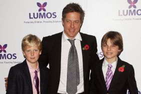 Hugh Grant (C) and Damian Hurley, son of Elizabeth Hurley, attend the Lumos fundraising event hosted by J.K. Rowling at The Warner Bros. Harry Potter Tour on November 9, 2013 in London, England.