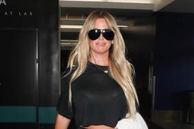 Kim Zolciak walking through LAX wearing sunglasses