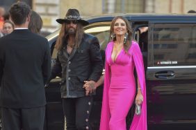 Billy Ray Cyrus and Elizabeth Hurley are seen arriving at the opening of the new Valentino Garavani space on May 24, 2025 in Rome, Italy.