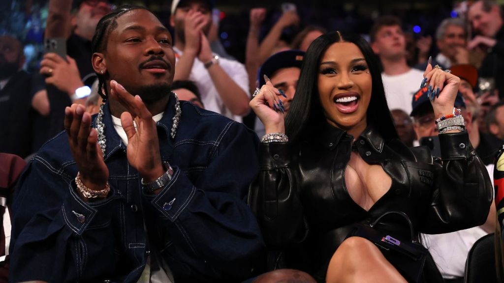 NFL Player Stefon Diggs (R) and rapper Cardi B (L) celebrate in the fourth quarter of Game Four of the Eastern Conference Second Round NBA Playoffs