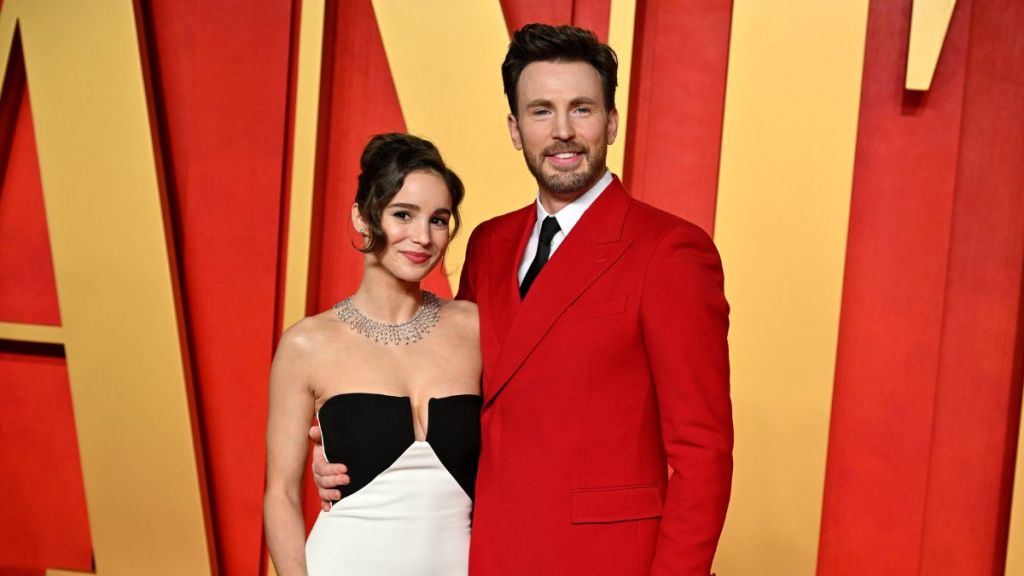 Alba Baptista and Chris Evans attend the 2024 Vanity Fair Oscar Party