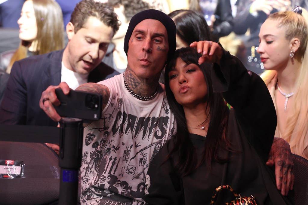 Travis Barker with his current wife